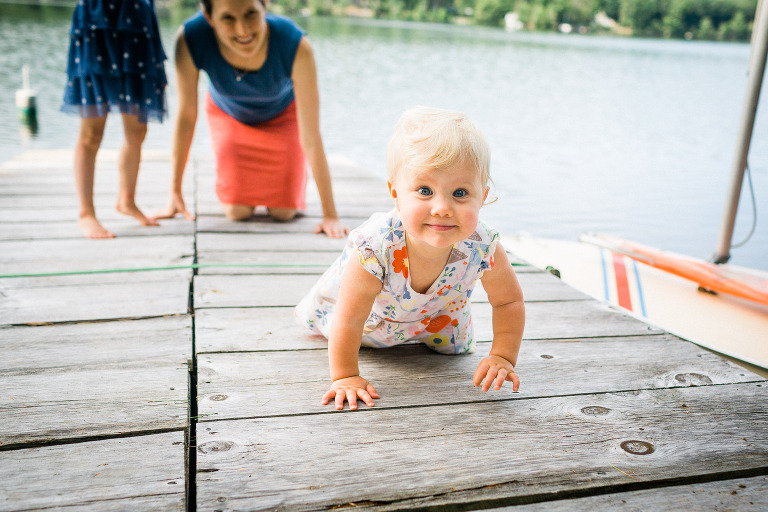 baby crawling on boat deck